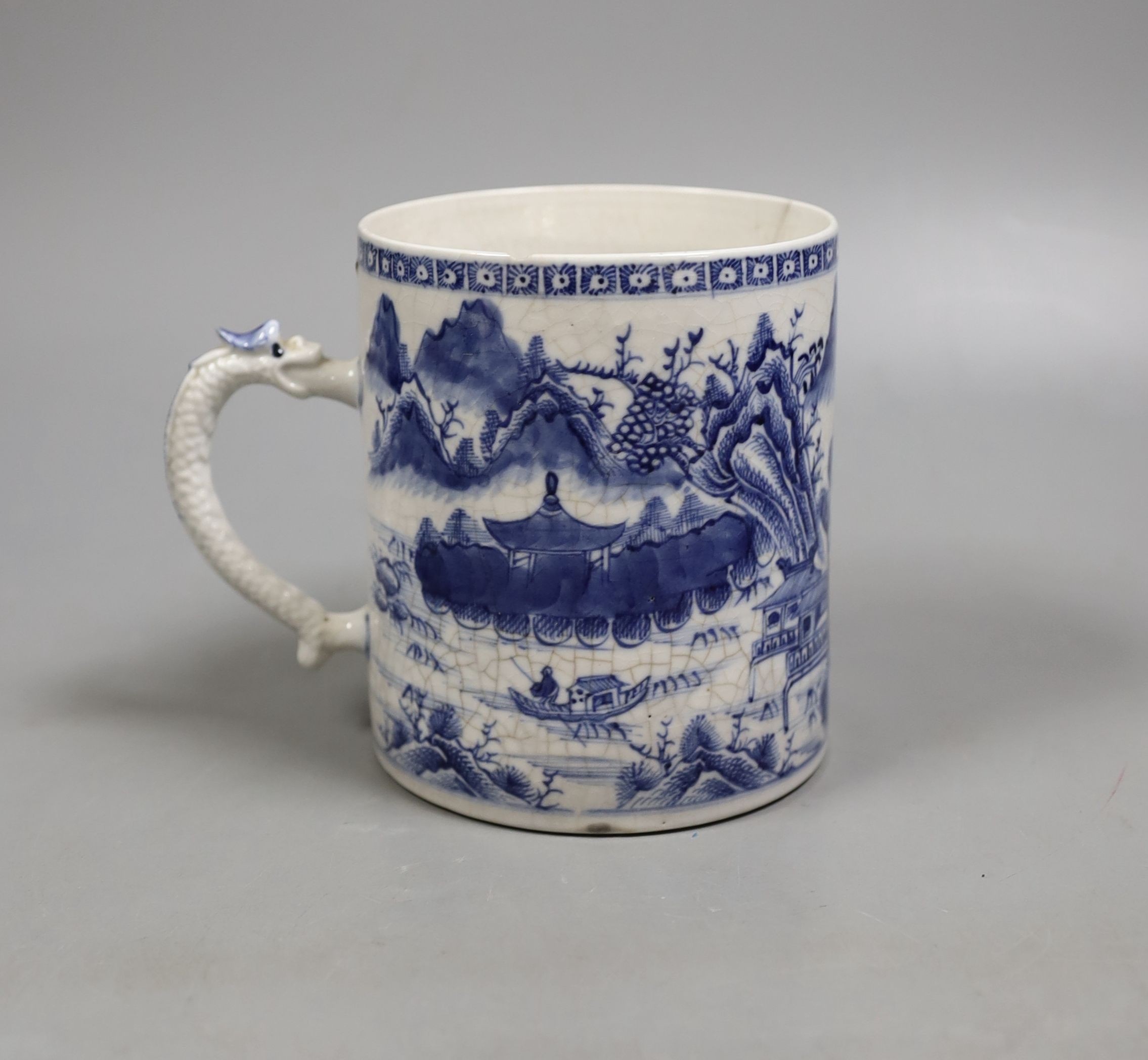 A Chinese blue and white mug, late 18th century, 11.5 cms high.
